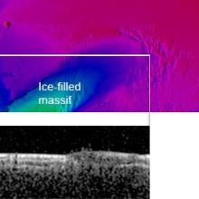 A topographic map with different colors, on the left hand bottom side there are two bright green sections with labels that read "ice-filled massif."