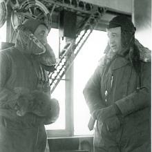 Portrait of Cmdr. J. H. Klein, U.S. Navy, and Capt. E. T. Pollock, U.S. Navy, in the control car of U.S. Navy airship ZR-3 Los Angeles after observation of an eclipse in 1925.