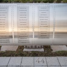 Silver metal plaque listing Wall of Honor Honorees.