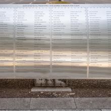 Silver metal plaque listing Wall of Honor Honorees.