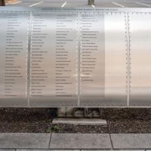 Silver metal plaque listing Wall of Honor Honorees.