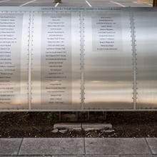 Silver metal plaque listing Wall of Honor Honorees.