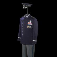 A military space themed uniform pictured against a black backdrop.