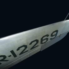 Underwing of Northrop Gamma Polar Star aircraft with "NR-12269" in black lettering