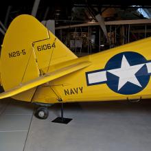 Yellow painted vertical stabilizer of an aircraft. 