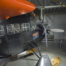 Close up view of a cockpit of a biplane