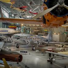 Silver painted commercial airplane displayed at the museum. 