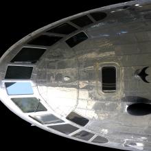 Top view of cockpit and nose of a commercial airplane. 