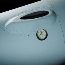 Pressure gauge on a winged glide-bomb missile.