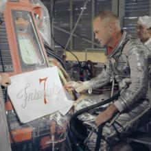 Astronaut John Glenn Inspecting the Placement of the "Friendship 7" Name