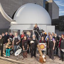 Staff and volunteers outside of the Phoebe Waterman Haas Public Observatory. 