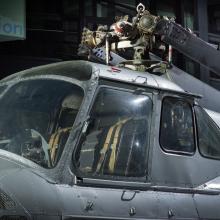 View of the cockpit and propellers of a helicopter. 