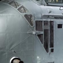 View of the cockpit and a valve of a helicopter. 