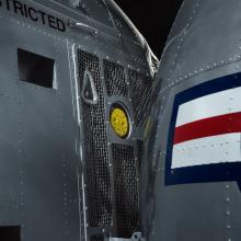 Close of view of an oil cap on an helicopter. 