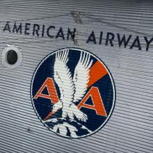 Close up image of an American Airways logo painted on a plane. 