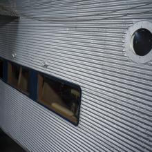 View looking into a passenger cabin of a plane.