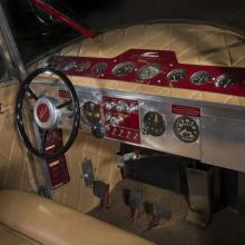 Interview of the cockpit of a airplane. The plane uses a steering wheel to control the plane. 