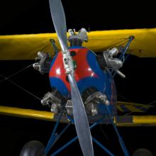 Propellers painted to a yellow and blue biplane. 