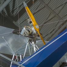 Close up view of an engine and propellers. 