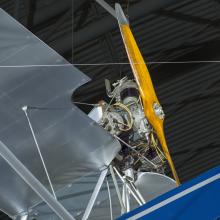 Close up view of an engine and propellers. 