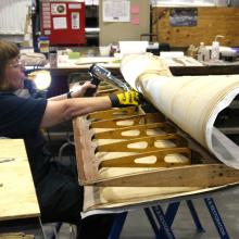 Conservator working on Flak-Bait