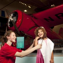 Museum Explainer with Young Visitor