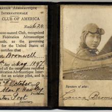 Old vintage aviator&#039;s license with a woman&#039;s face.