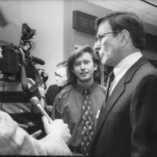 Leonard Nimoy, a white man, visits the opening of the Museum's Star Trek Exhibit in 1992. A member of museum staff is with him to escort Nimoy to museum events.