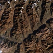 Satellite view of a set of brown mountains that are part of the Andes Mountain Range in Argentina.