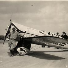 Col. Roscoe Turner Posing with Racer