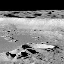 Large cliff on the Moon that makes up part of the outer section of a crater.