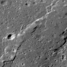 Small areas of troughs created from stretching lunar crust on the Moon. They are most visible in the upper half of the perspective.