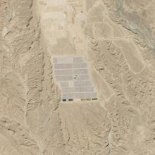 Satellite view of a solar power plant in a large desert in Morocco.