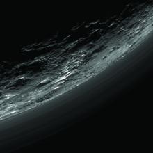 Close-up view of translucent haze in terrestial dwarf planet Pluto's atmosphere.