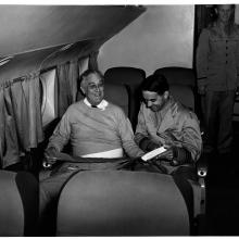 U.S. President Franklin Roosevelt sits in a plane seat as the first U.S. president to fly in a plane.