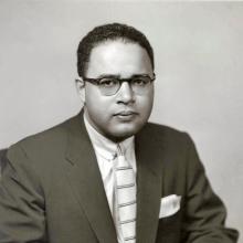 Charles C. Diggs, Jr., an African-American Congressman, poses formally.