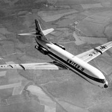 Top view of commercial aircraft with two engines, one each on the rear of the fuselage. Aircraft is in flight and features United Airlines livery.