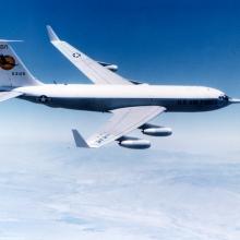 An aircraft performs testing with vertical tips called winglets at the end of both wings. The aircraft is in flight.