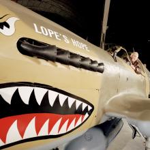 Don Lopez in cockpit of Curtiss P-40