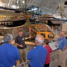 An expert curator gives a presentation at the Udvar-Hazy Center as part of his job responsibilities.