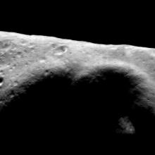 A mosaic view of a oblong-shaped asteroid.