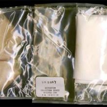 A clear package featuring a fecal collection device and wipes. The outer package is marked for its purpose.