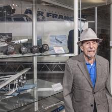 Bruce Del Mar with Donated Artifacts