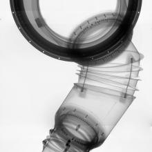 X-ray scan of the arm unit of an experimental early spacesuit. Flexibility can be seen in the elbow, shoulder, and wrist regions.