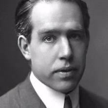 Professional portrait of Niels Bohr, a white man.