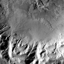 Satellite view of alluvial fans on Mars, which are areas of sediment which are deposited away from geographic features such as rivers.