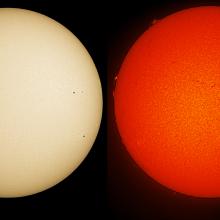 Two disk views of the Sun. The left image shows the surface of the Sun, with only two sunspots (dark spots) visible on the far right side of the disk. The right disk shows the Sun's atmosphere, with the sunspots on the surface appearing on the right side of the right disk with small lighter-colored phages around them. Prominences (spots floating off the edges) of floating gas and filaments (dark lines) of floating gas are visible as well, mostly on the upper half of the disk. 