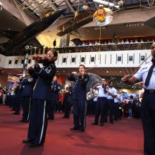 A group of musicians who are part of the U.S. Air Force perform unexpectedly at the Museum.