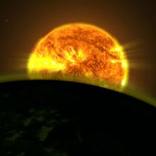 An illustration of the light of a star illuminating a planet with a hazy appearance.