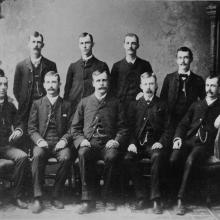 A group of ten white men known collectively as the 'Ten Dayton Boys'. Wilbur Wright was a member of this group, alongside his two older brothers, Reuchlin and Lorin.